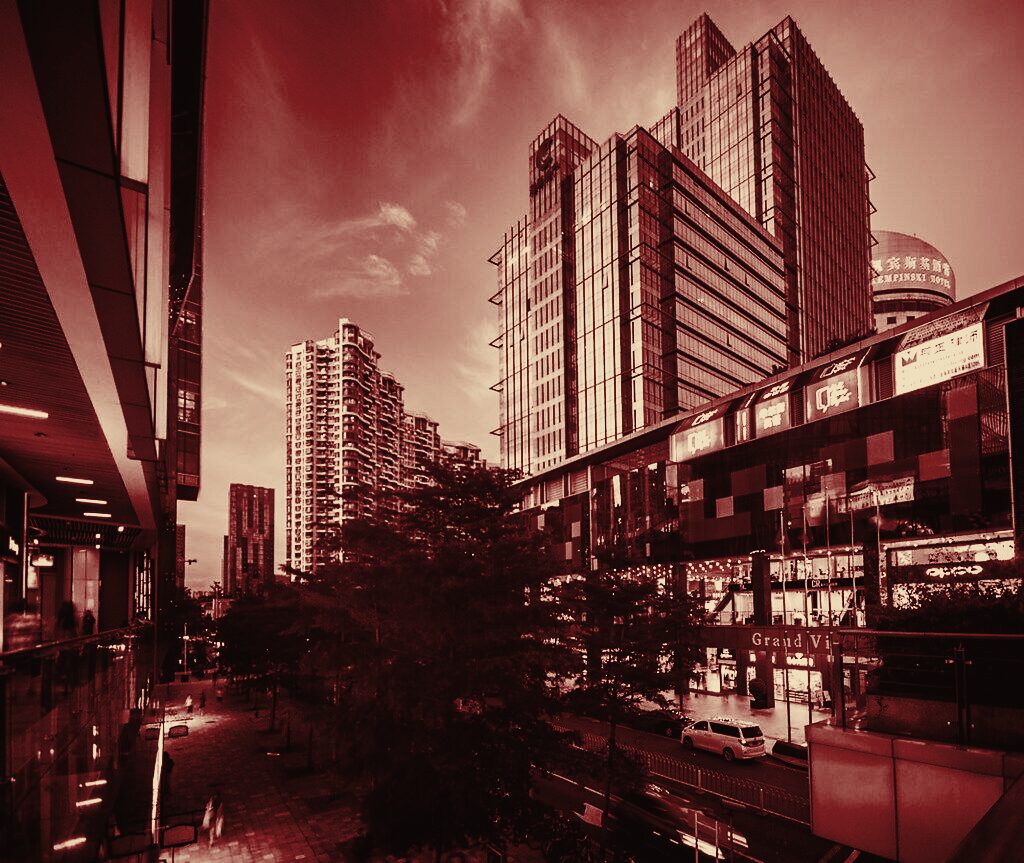The central business district of Shenzhen at dusk, in duotone grade
